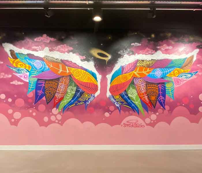 Muurschildering vleugels met graffiti