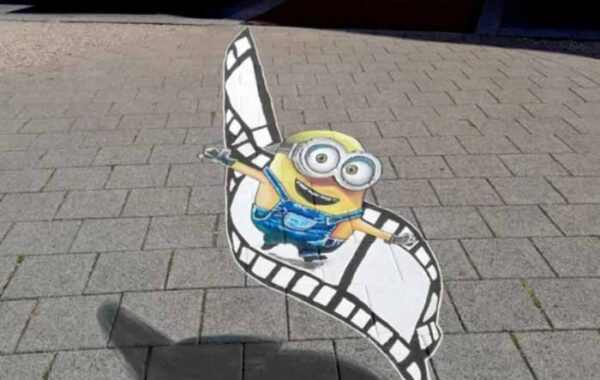 Graffiti straatschildering Minion